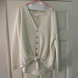 Adorable v neck sweater with buttons!
